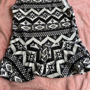 Black and white tribal print peplum shirt